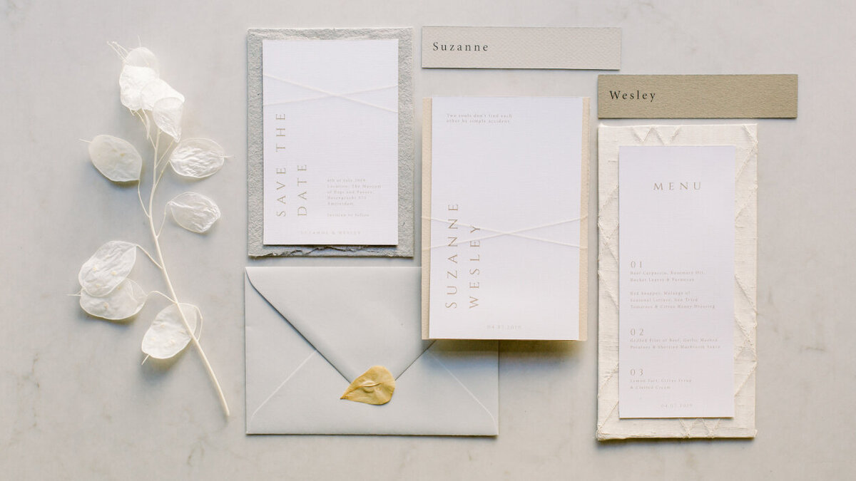 Elegant wedding stationery with golden touches for an intimate wedding photoshoot at the Tassenmuseum organized by Lovely & Planned