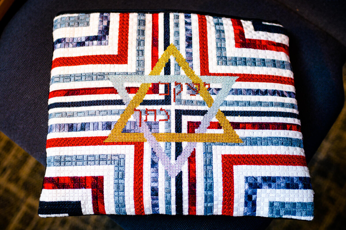 Details of an embroidered mitzvah pillow