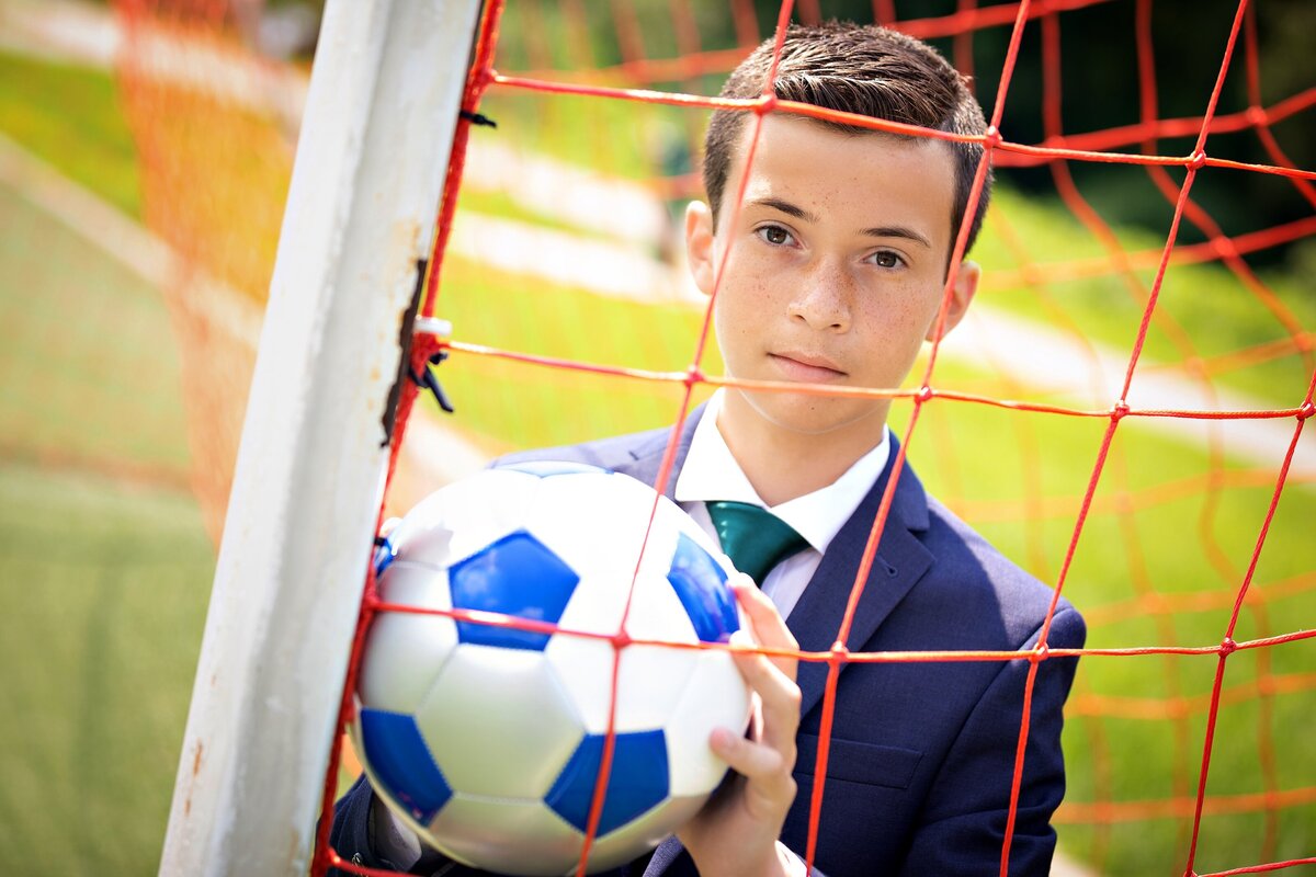 bar-mitzvah-preshoot-boy-in-soccer-net-nj