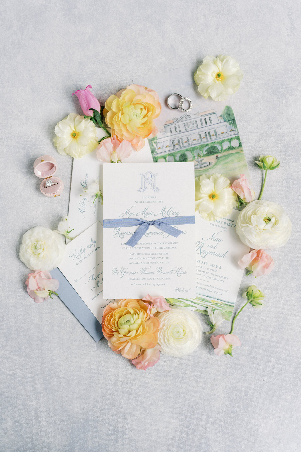 Wedding day details. Blue and white wedding invitations with a touch of yellow and green. Charleston spring destination wedding. Film photographer.