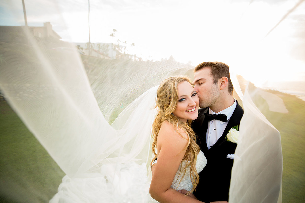 Couple Under Veil in La Jolla During La Valencia Wedding