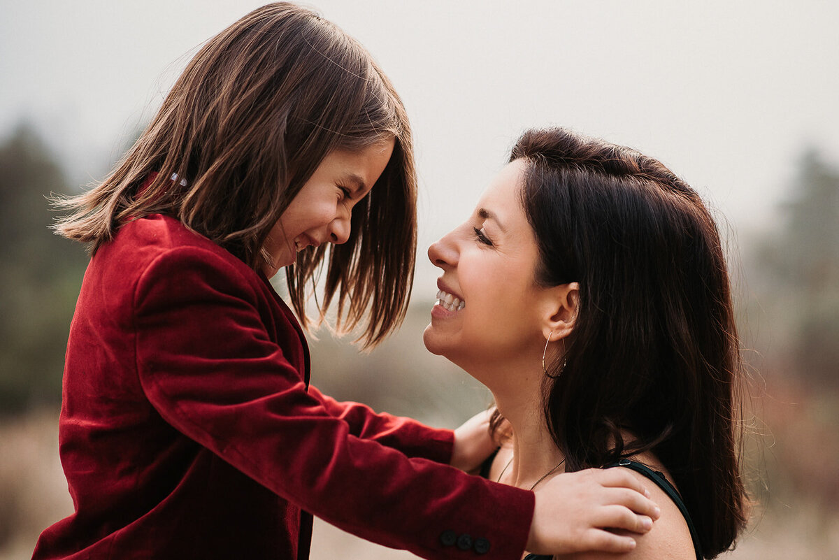 Little boy looks into mom's eyes