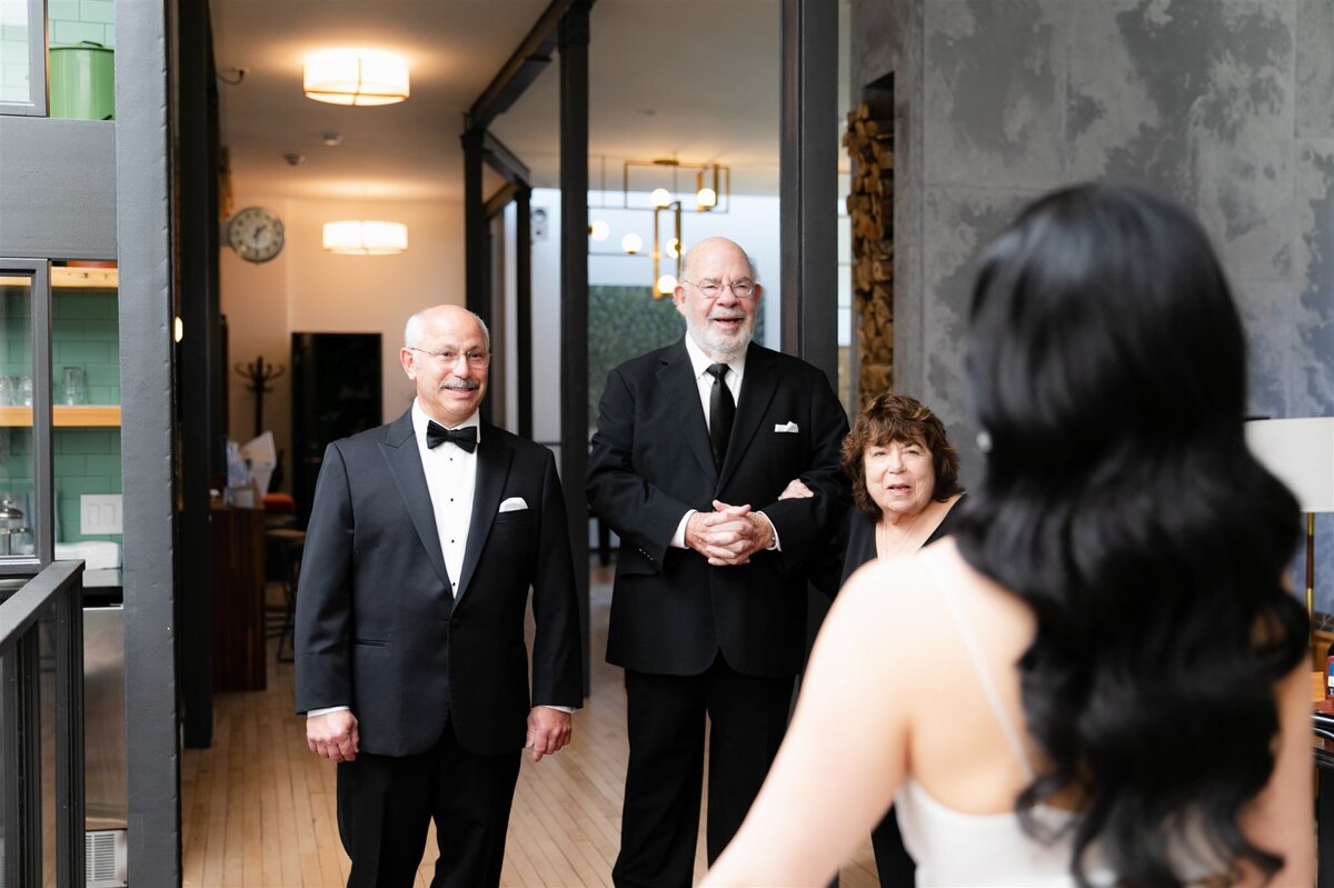 Three family members' shock and excitement are captured during Moody Tongue Brewery wedding first look.