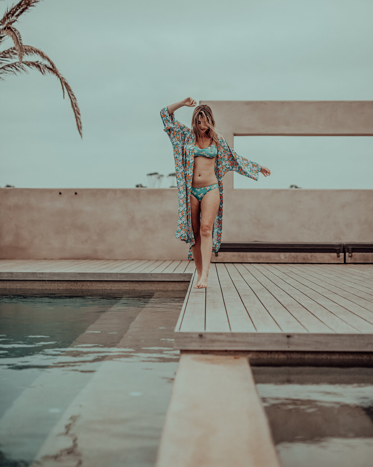 Poolside glamour with model wearing bikini