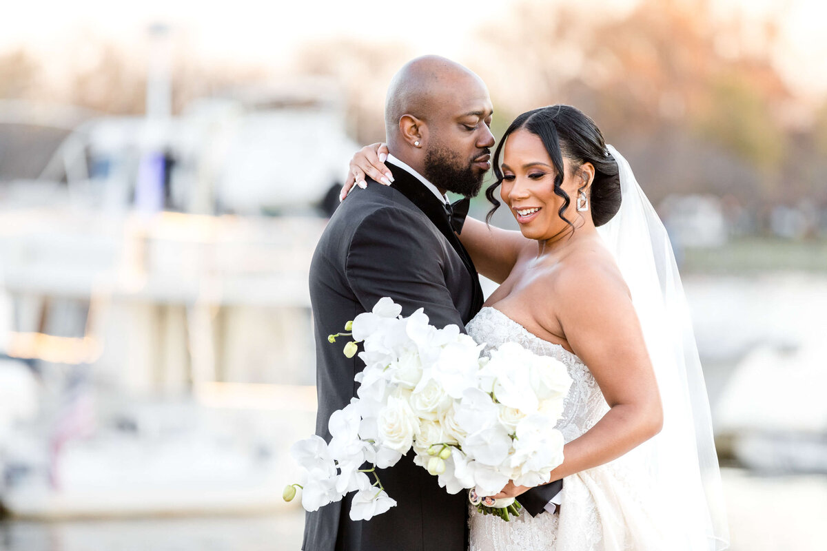 10_BrideGroomPortrait_DCWharf_HowertonWooten