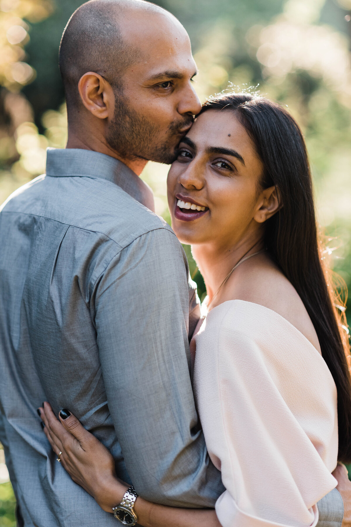 Indian couple smiling and kissing