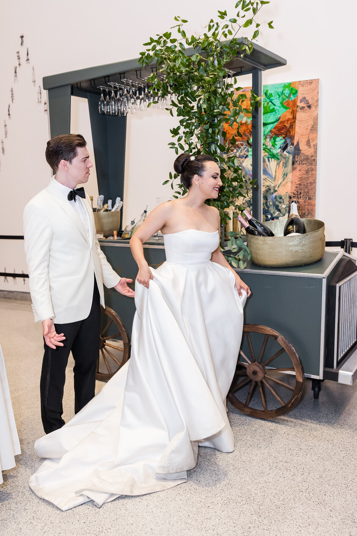 bride-and-groom-with-champagne-cart