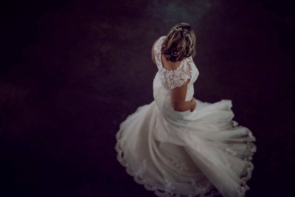 unique_dress_shot_bride_dancing_wedding_photography_zolu