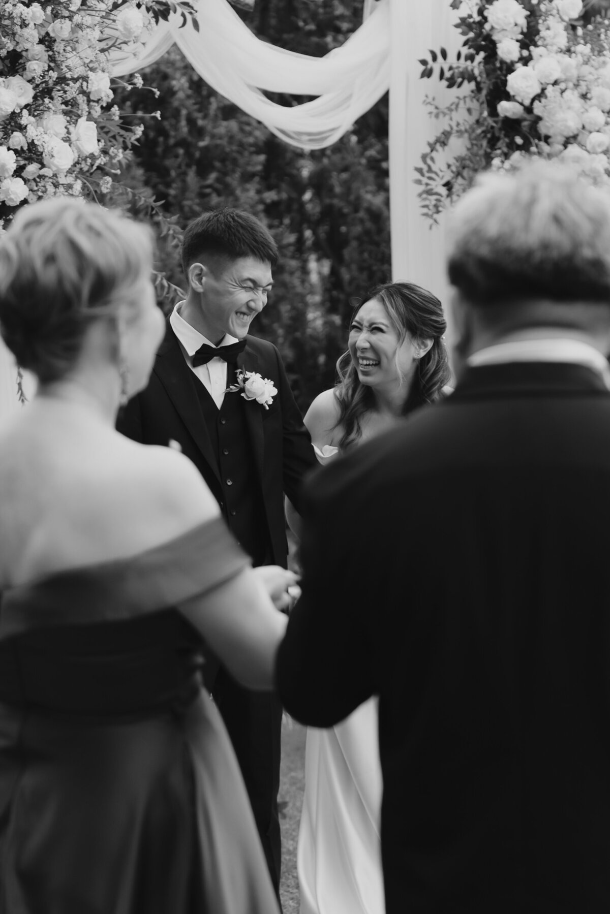the couple laughing after the wedding ceremony