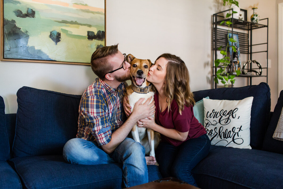 couple and their dog in their home lifestyle photoshoot