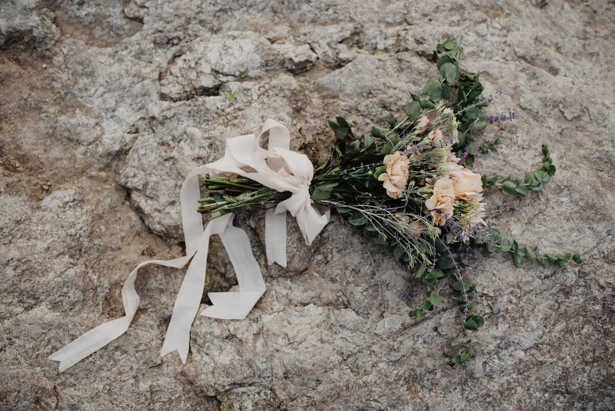 Jackson Hole Photographers capture bouquet laying on bouquet