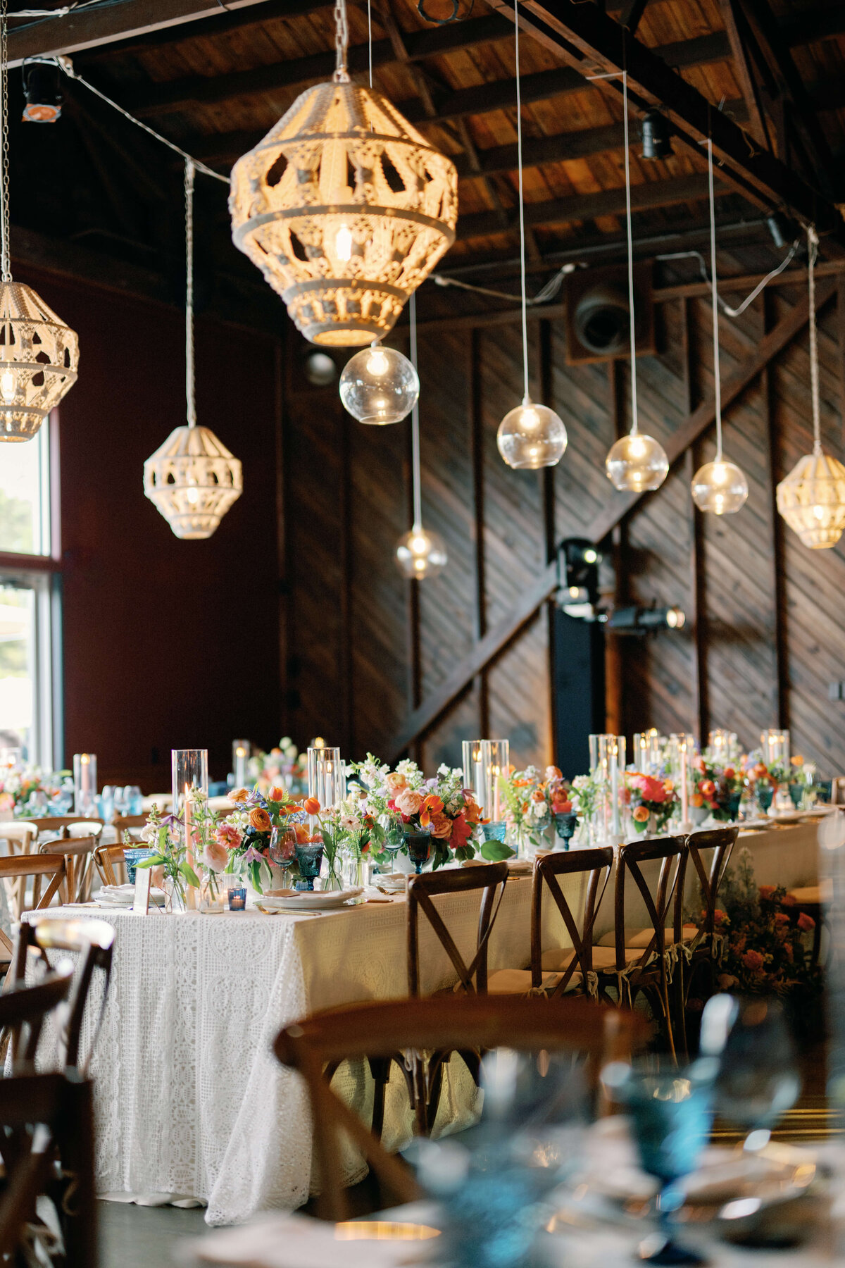 Hanging lanterns and wedding table