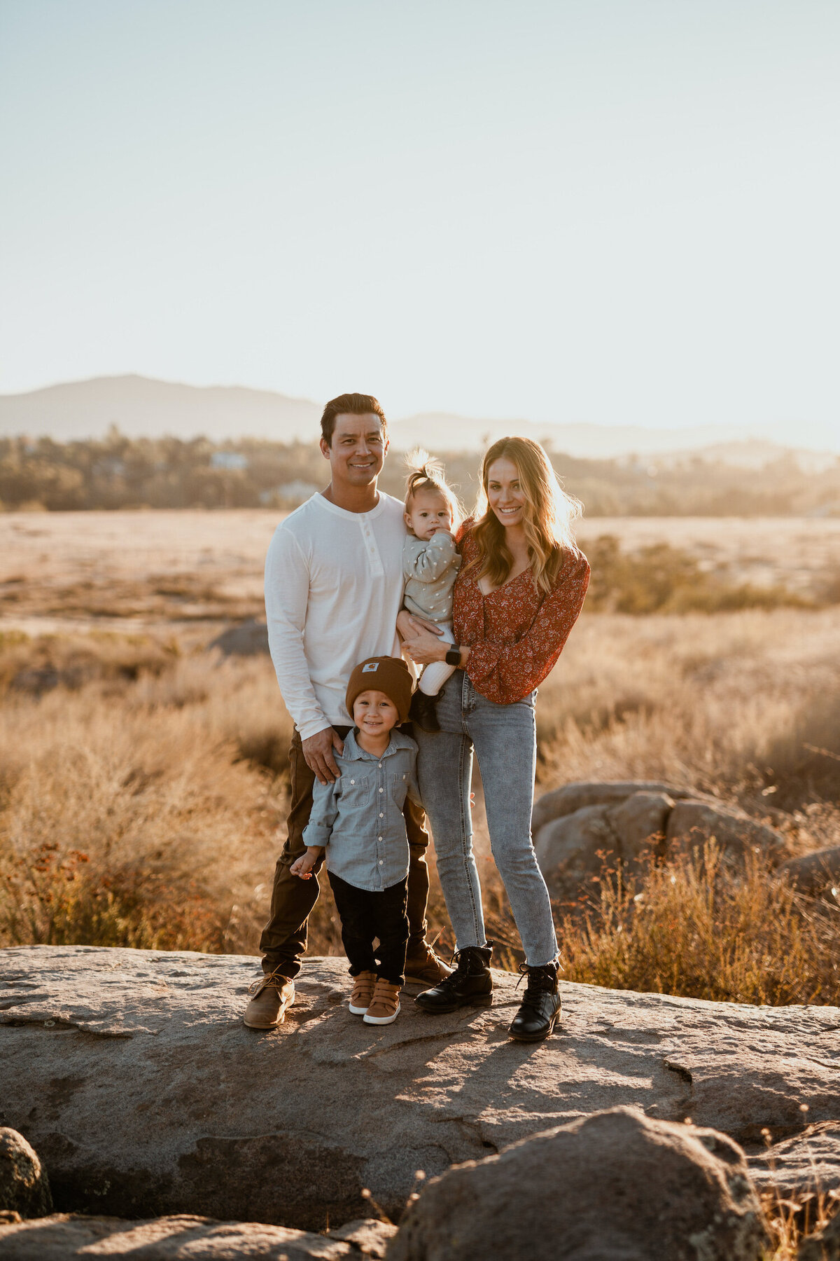 Mom Dad and Kids posing together for family photoshoot in Mount Laguna San Diego California