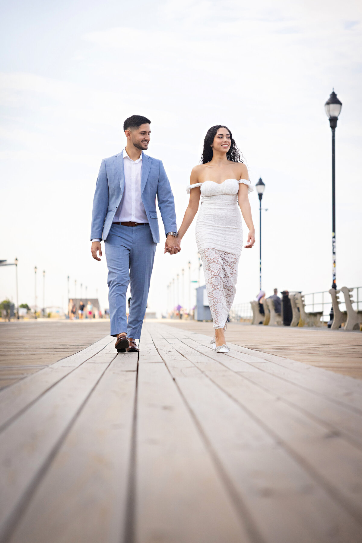 engaged-couple-walking-candid-asbury-park
