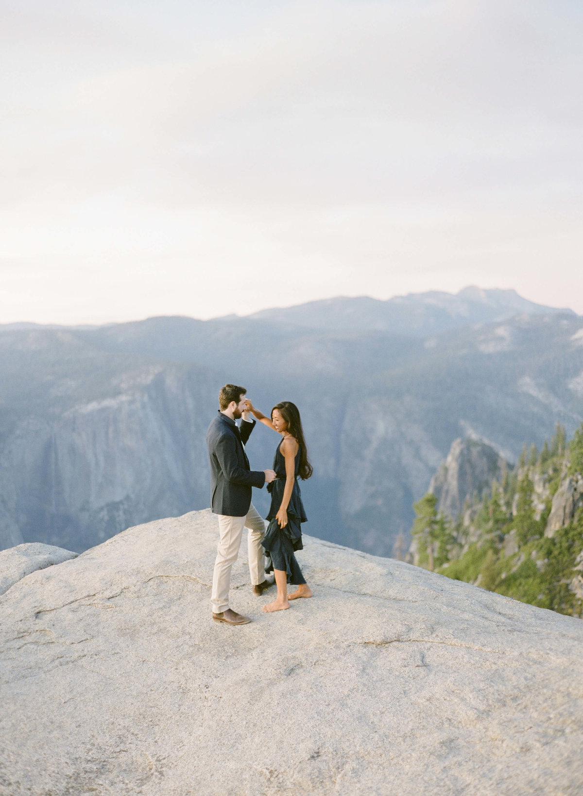 85-KTMerry-destination-engagement-photography-Yosemite-couple-dancing
