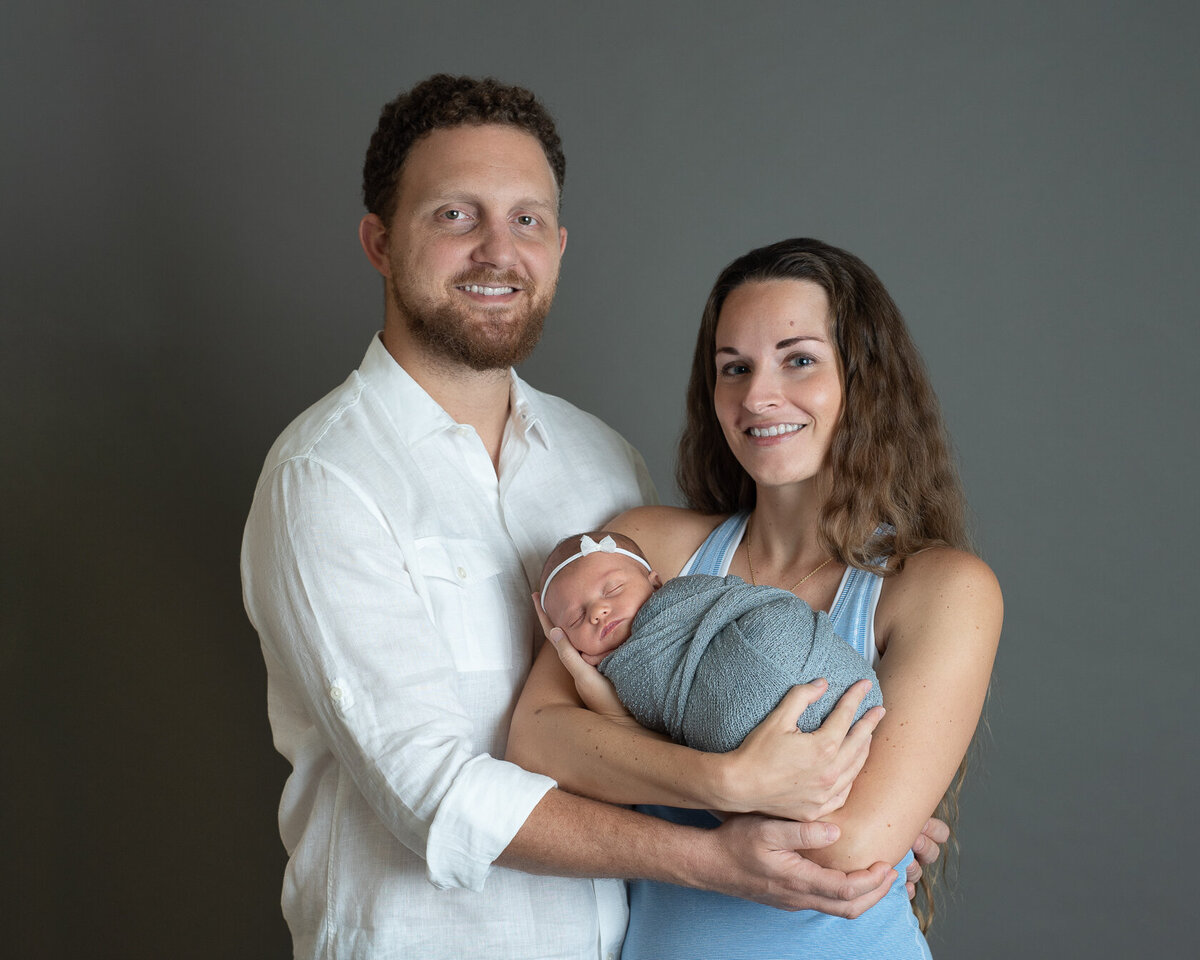 Newborn and family portrait Captured by Laura King