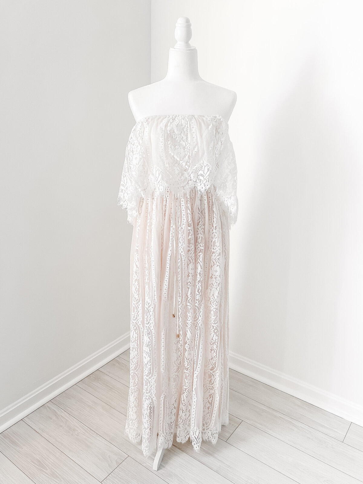 A Northern Virginia Maternity Photographer off the shoulder lace white dress with a nude underlayer