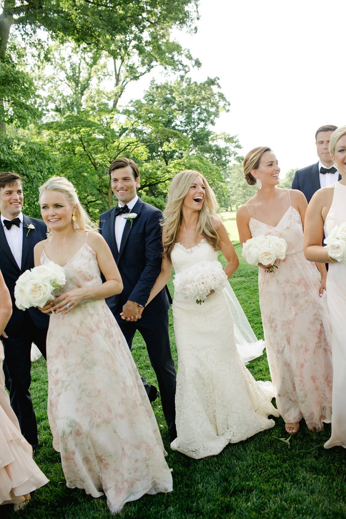 Blush summer wedding bridesmaids and bride peony bouquet