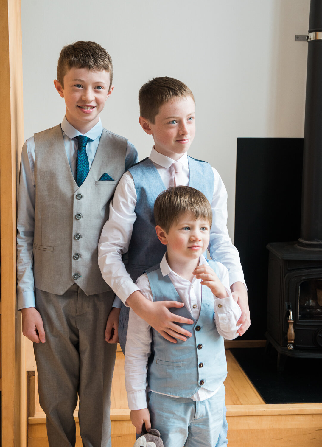 Three brothers in wedding suits