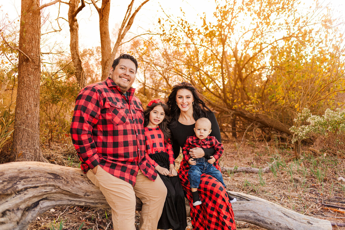 Family standing near Suffolk Riverfront at Sleepy Hole Park for Family Photo Session at Sunset in Fall - Rebekah Heffington Photography