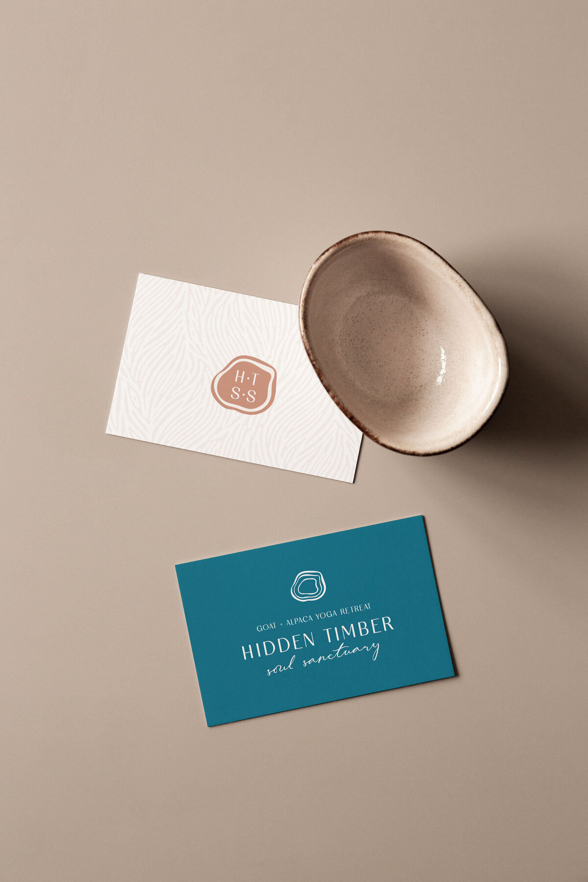 Branded business cards for with simple icon and leaf pattern