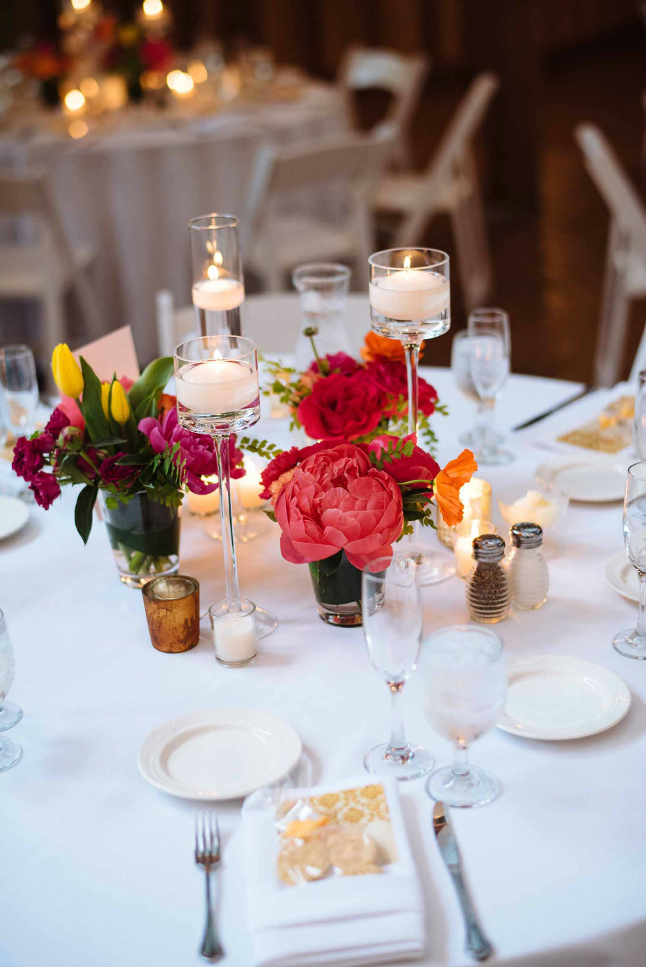 Bright composite wedding reception table design.