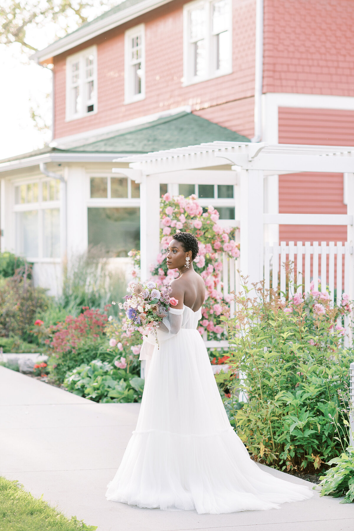 Stunning bridal portrait outside of Deane House, historical and unique Calgary, Alberta wedding venue, featured on the Brontë Bride Vendor Guide.