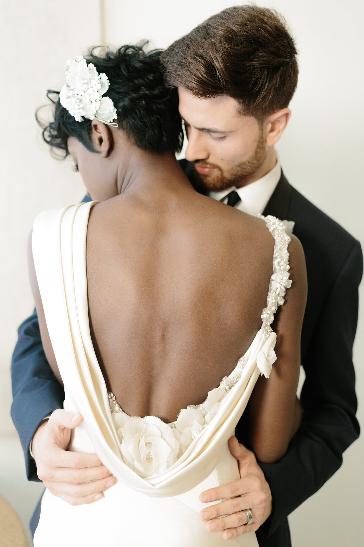 Groom_Kissing_neck_spectacular_affairs_rustic
