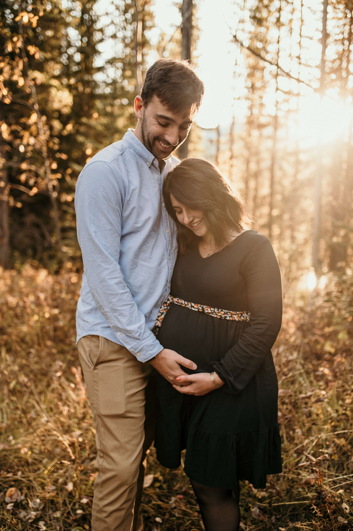 man and woman in maternity photoshoot