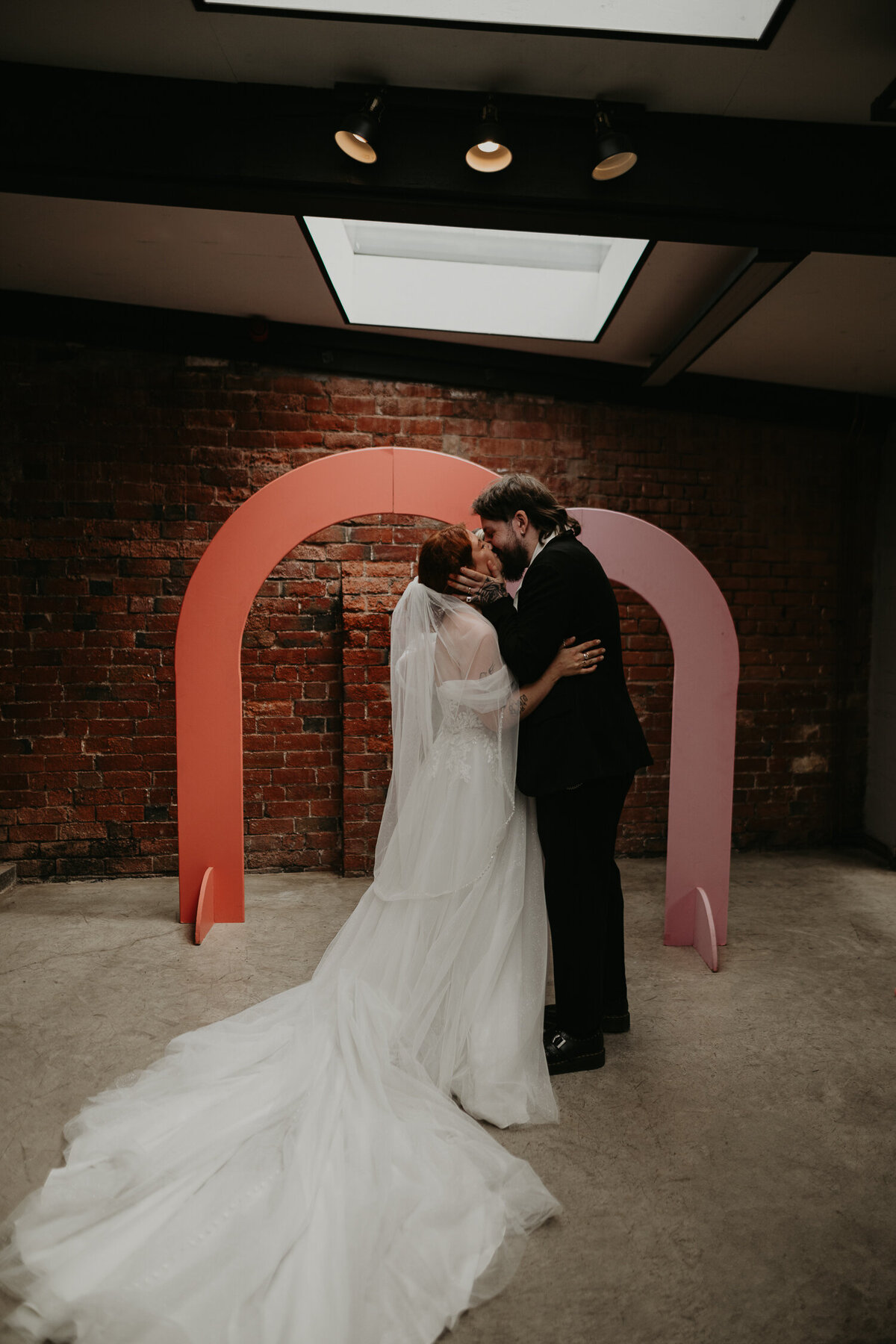 Bride an Groom's first kiss at their wedding ceremony at The Shack Revolution. 