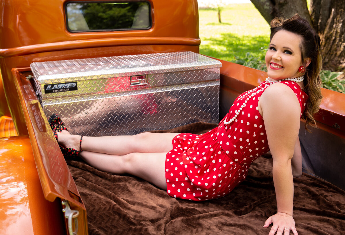 goddess studio boudoir woman vintage jumper red with white polka dots cherry heels old ford pickup bed pinup style