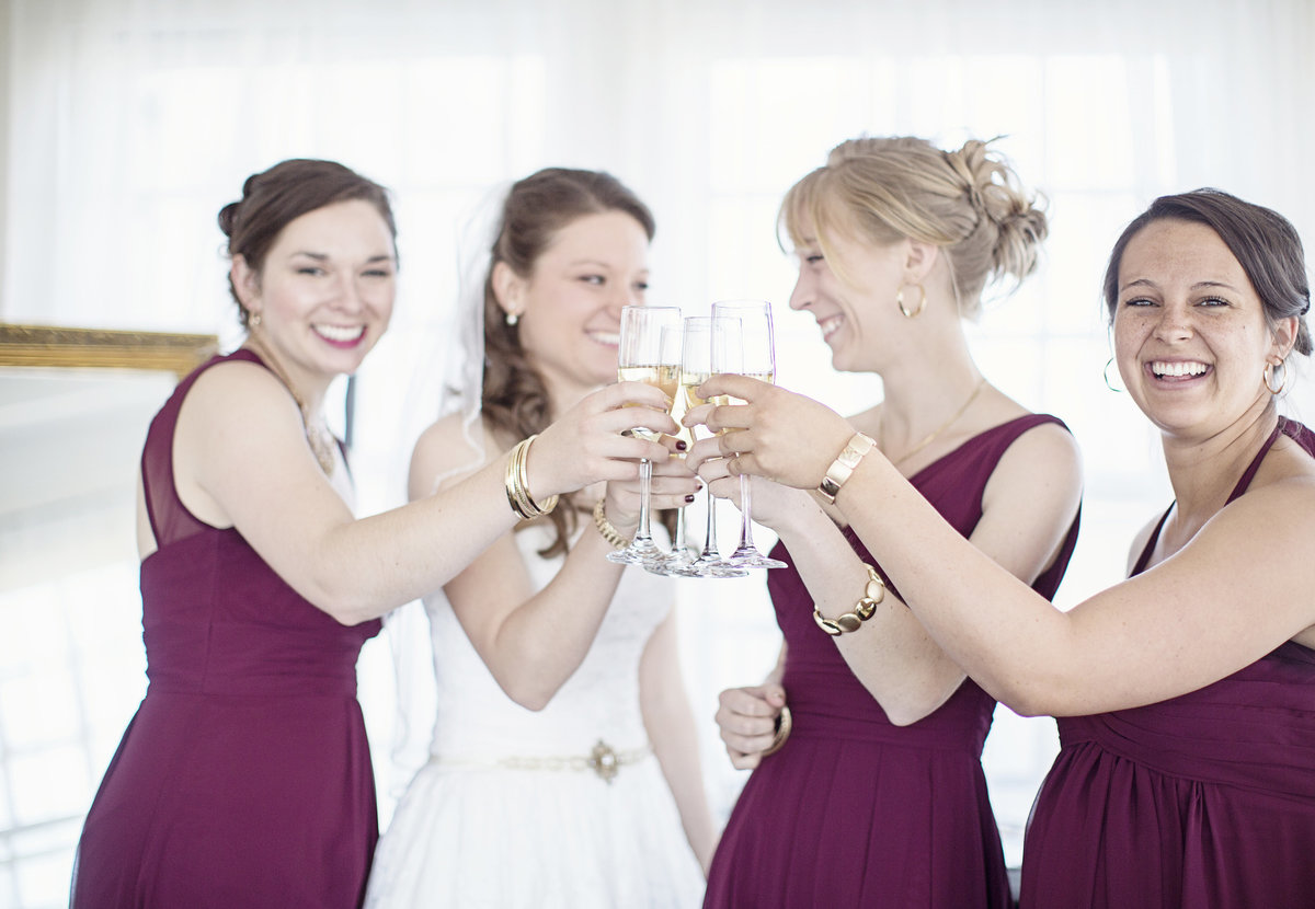 bride bridesmaids champagne toast  Milwaukee Wisconsin wedding  photographer