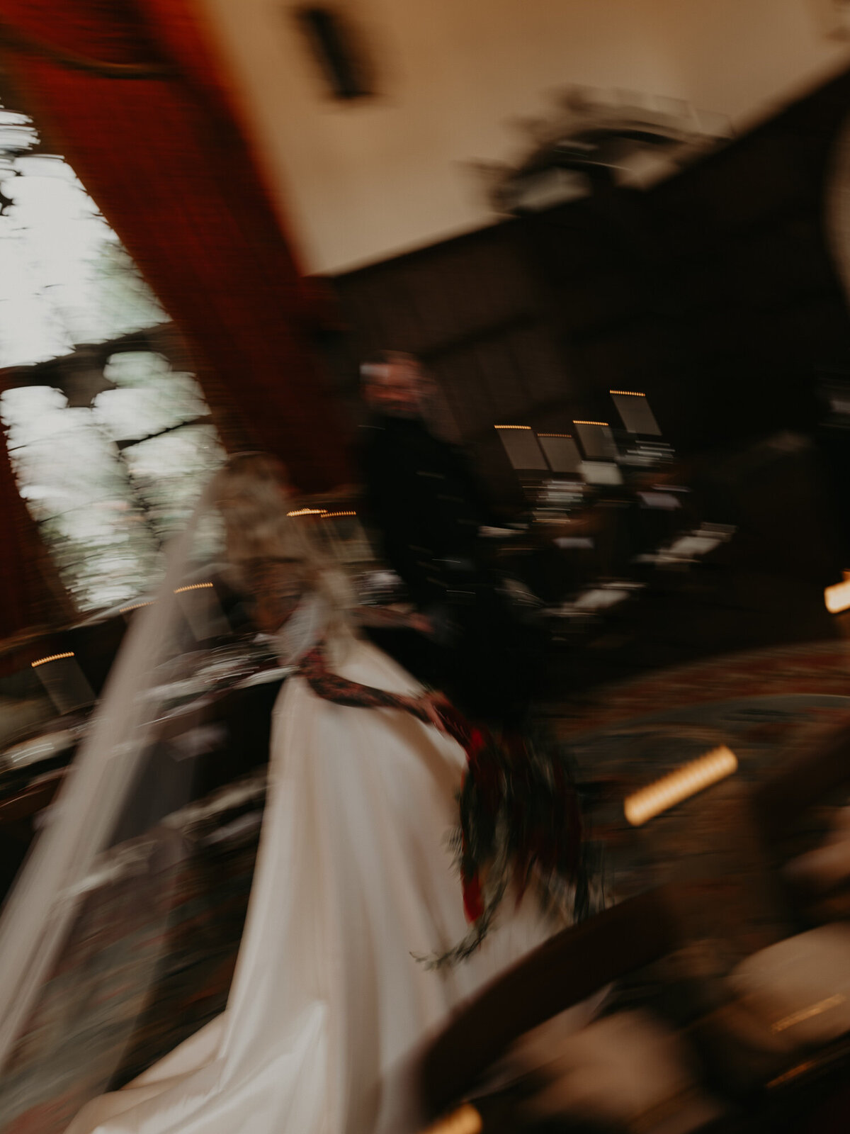 Slow shutter photo of a bride and groom at Lympne Castle in Kent.