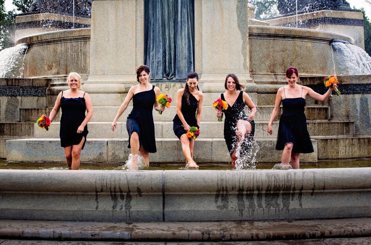 bridesmaids in fountain photo