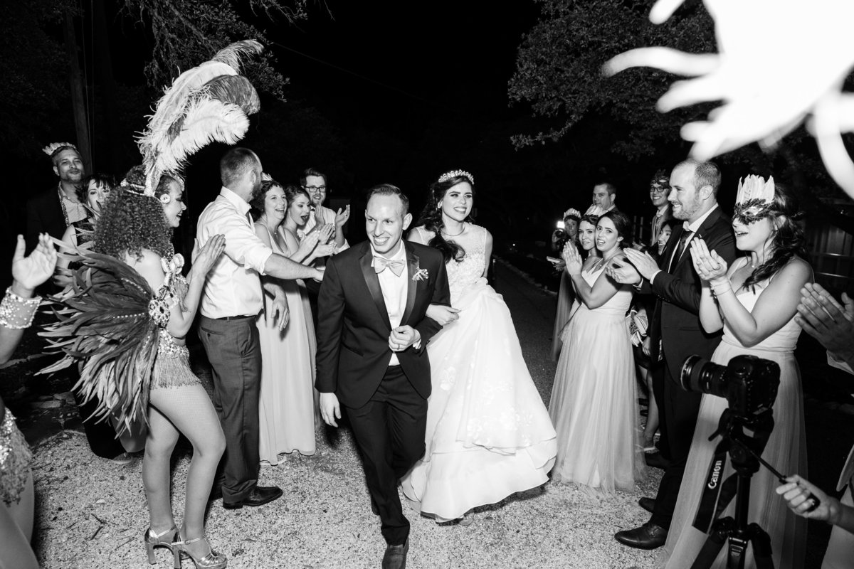 addison grove wedding photographer bride groom exit carnival dancers 11903 Fitzhugh Rd, Austin, TX 78736