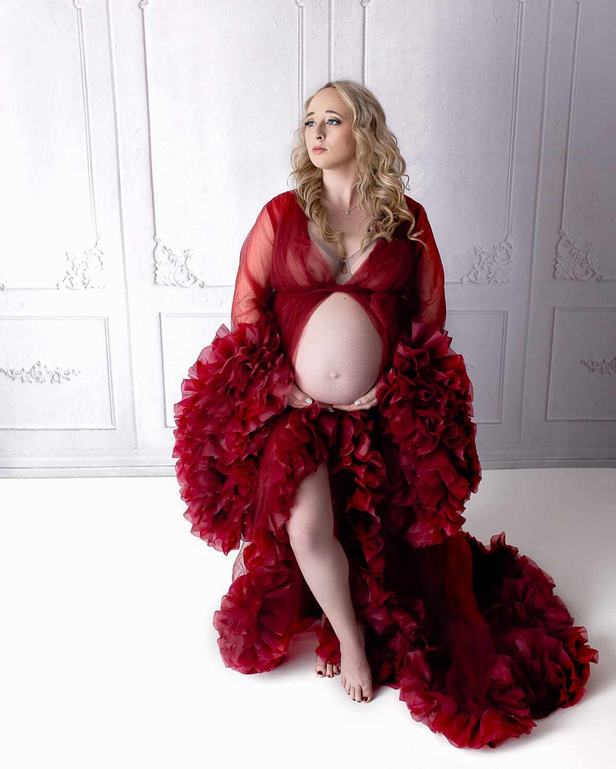 Deep red dress in studio akron canton maternity session.