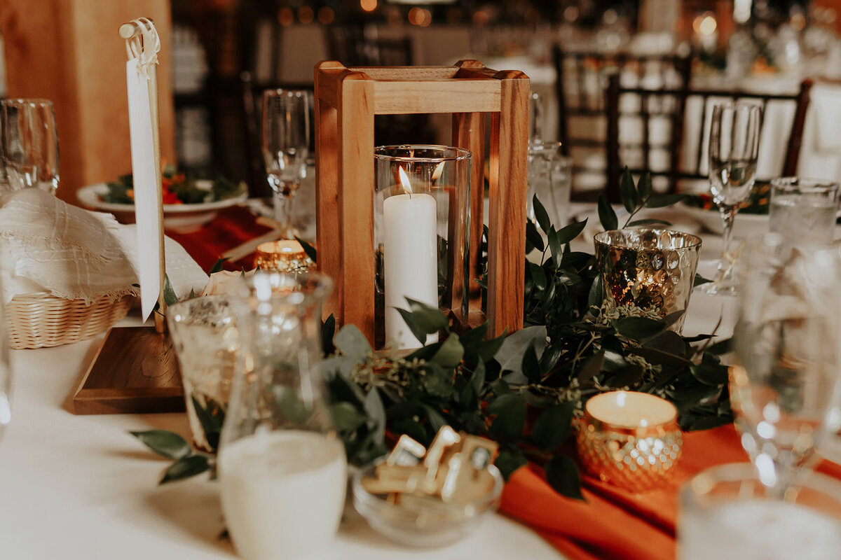 Terracotta accents with greenery and candles