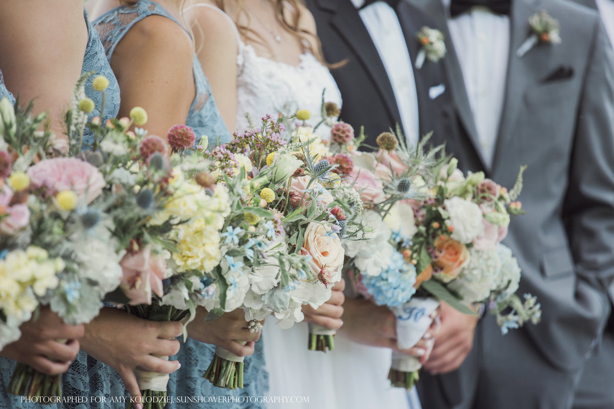 charlotte wedding photographer jamie lucido captures a side detail of the wedding party with bouquets