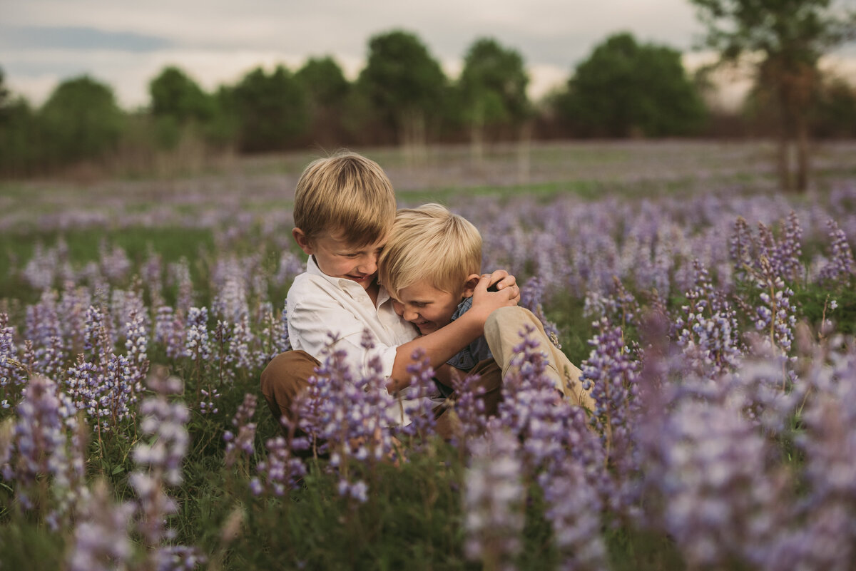 two young boys in lupine field