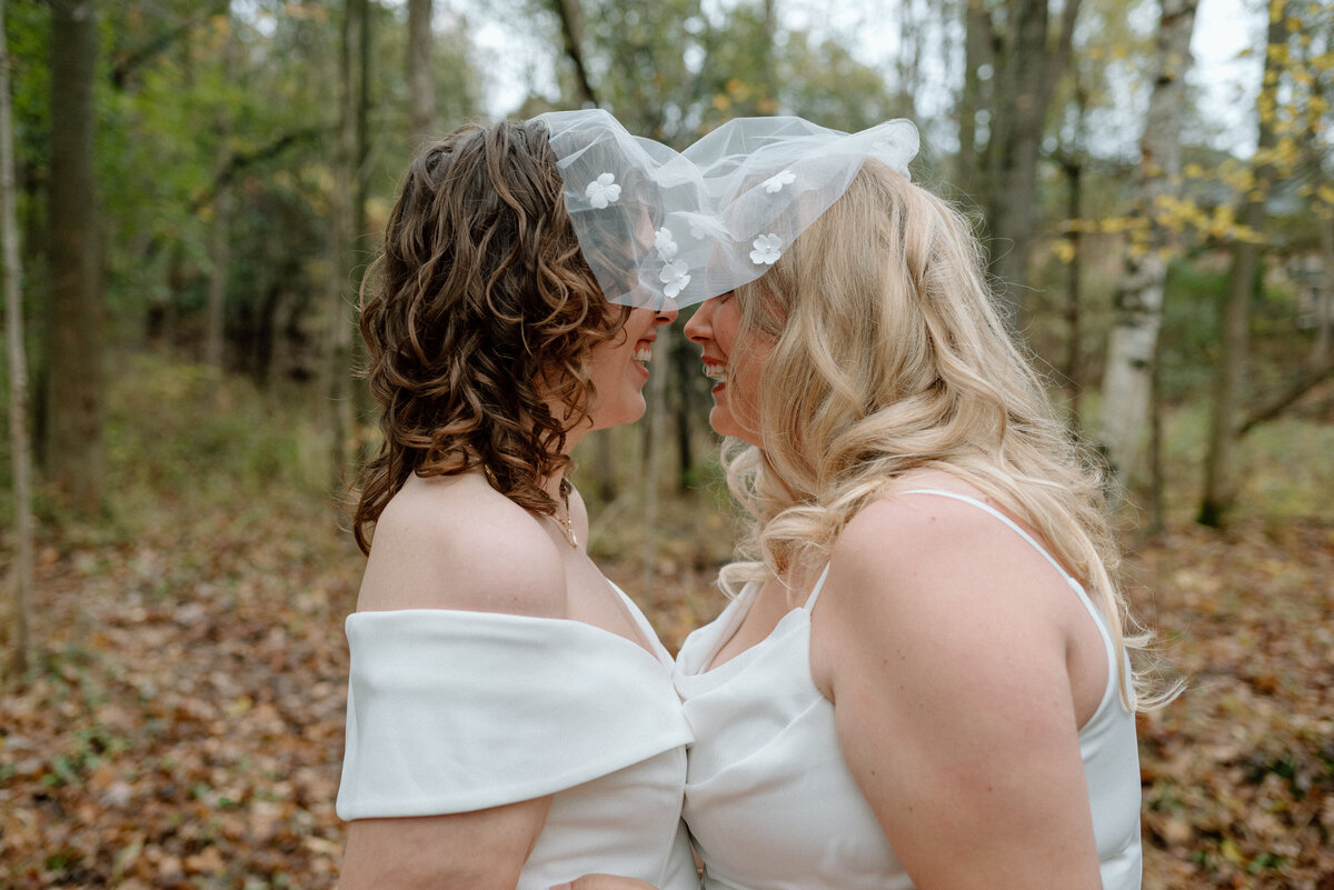 two brides getting close after their first look