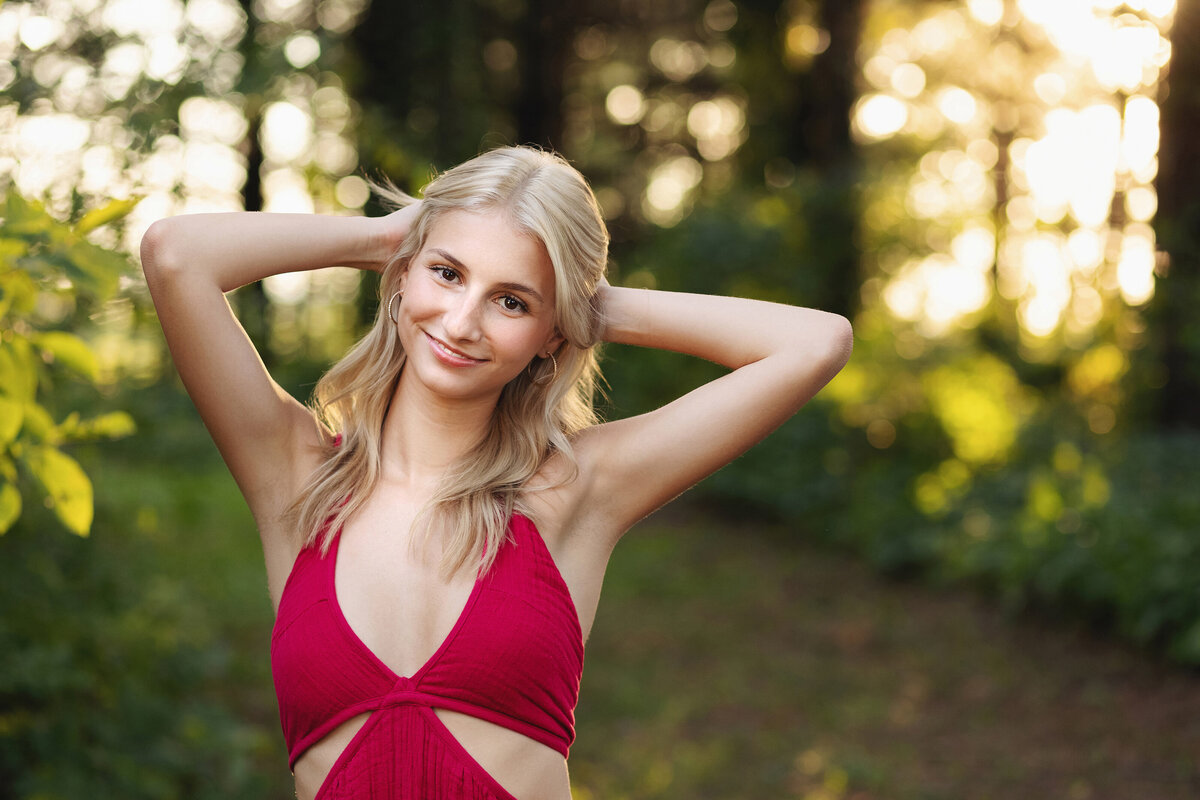 girl in red dress in nature