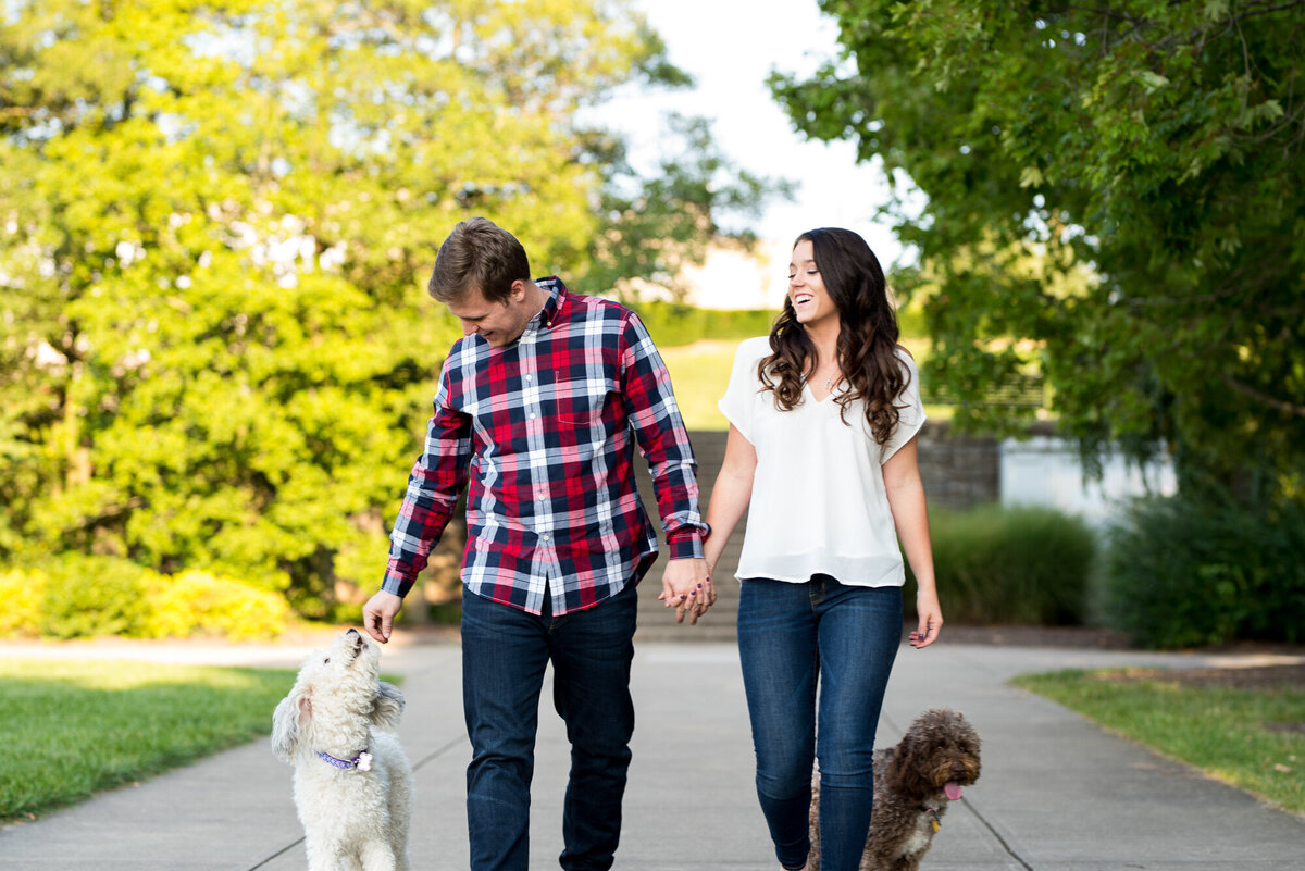 Couple walks their dogs during their Cincinnati engagement session