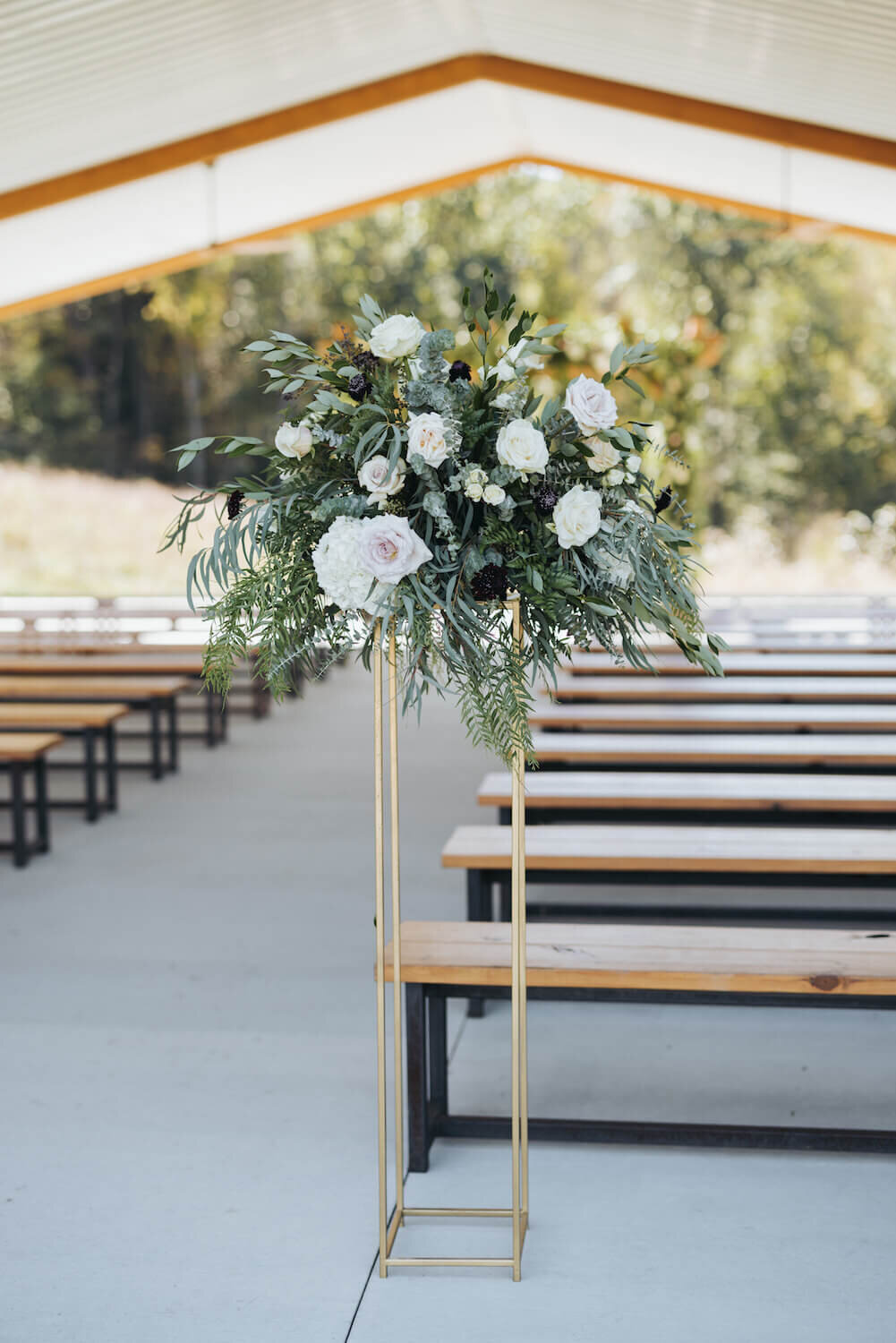 Shannan and Alex Wedding - standing floral arrangement