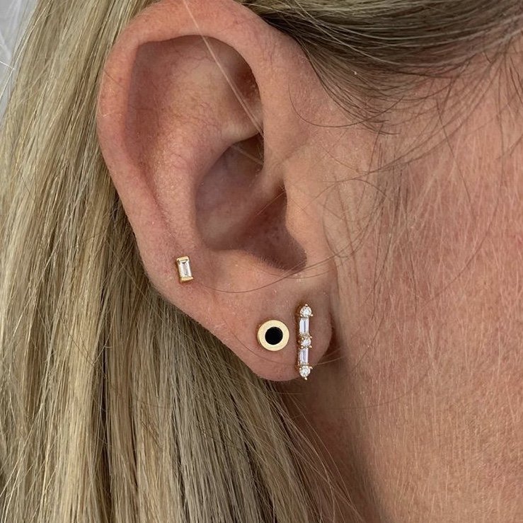 Ear piercing two Kalen Ashford