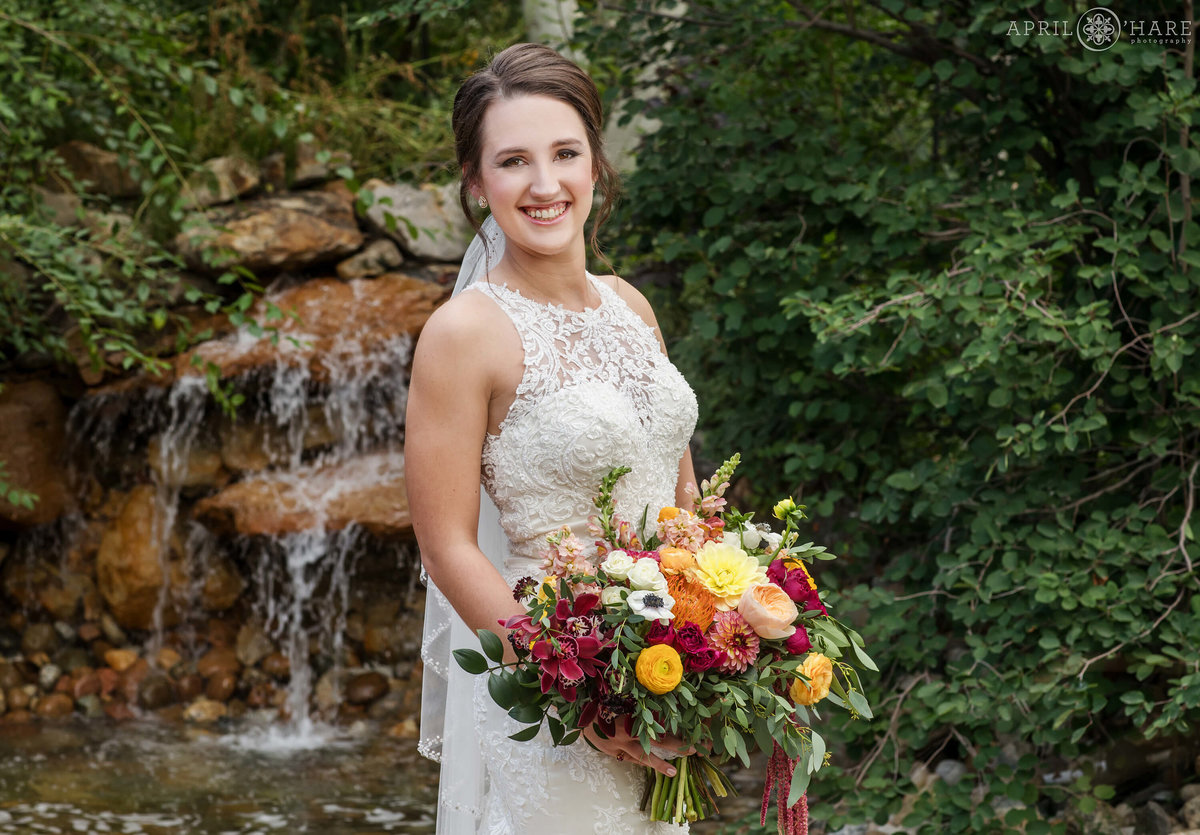 Church Ranch Event Center Waterfall Bridal Portrait During Summer