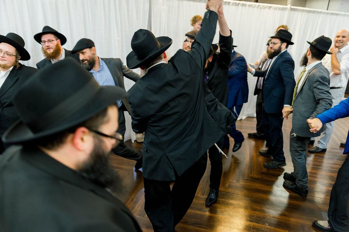 Eliana-Melmed-Photography-Chicago-LosAngeles-Jewish-WeddingPhotographer-CarmiKalman-MensDancing-00059