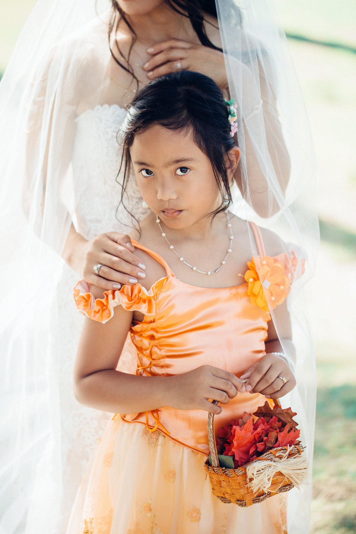Wedding Photograph Of Flower Girl In Orange Dress Los Angeles