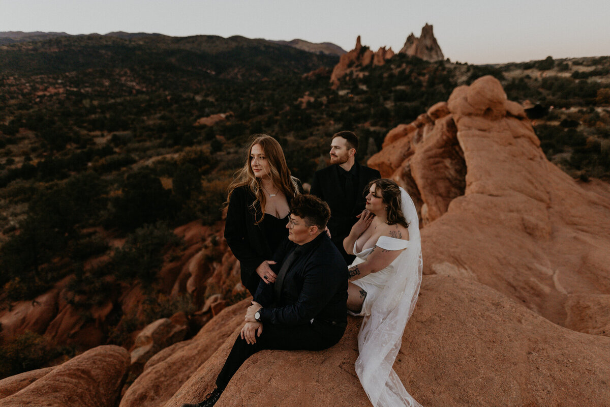 bride and groom with their two guests in Garden of the Gods in Colorado