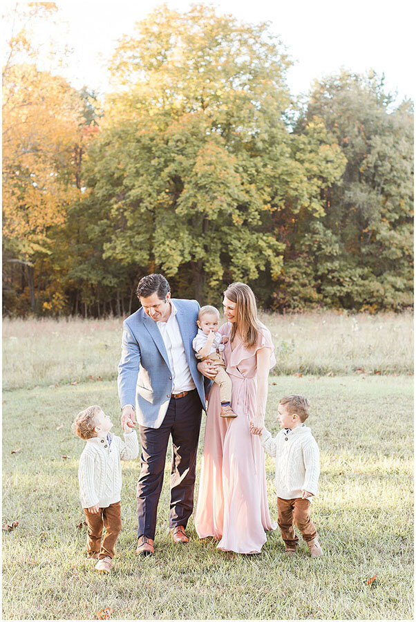 A stunning family portrait outdoors in the Fall by Northern Virginia Newborn Photographer