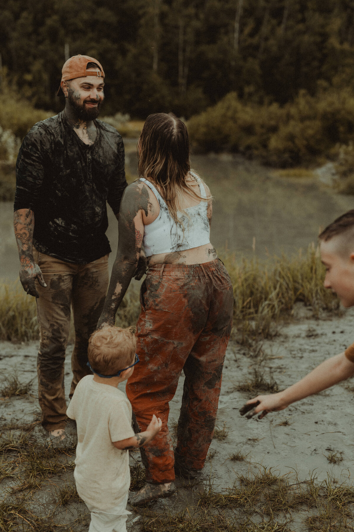 mud fight from family photo session